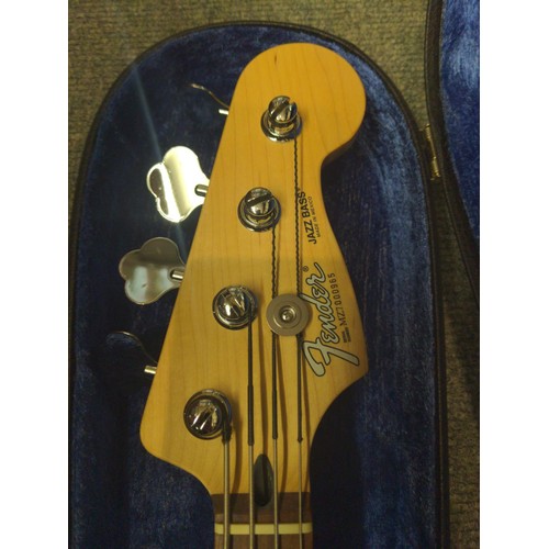 1160 - fender Jazz bass guitar, made in Mexico. Model number NZ7000965. In lacquered maroon body with maple... 