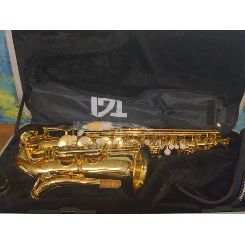 1165 - Elkhart Series 2 Alto saxophone in padded case with music stand.