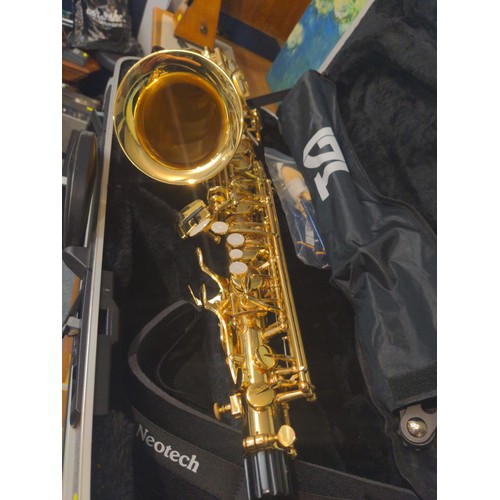 1165 - Elkhart Series 2 Alto saxophone in padded case with music stand.