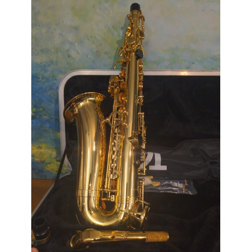 1165 - Elkhart Series 2 Alto saxophone in padded case with music stand.