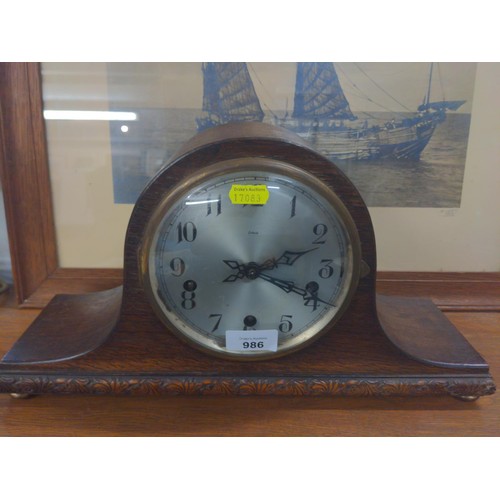 986 - Enfield Admirals mantle clock wooden with brass feet and decorated plinth. H 22 L 43cm key and appea... 