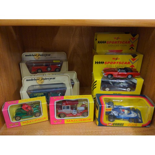 1059 - Boxed matchbox and Meisto cars over two shelfs 