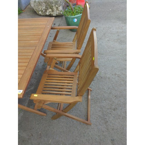 138 - Folding teak garden table with 4 folding teak chairs