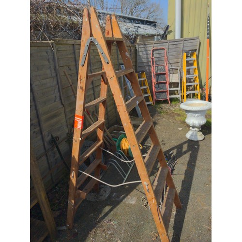 32 - Decorative wooden step ladder. Appears to have some worm damage.