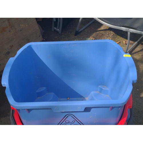 39 - 7 wheeled buckets / mop buckets