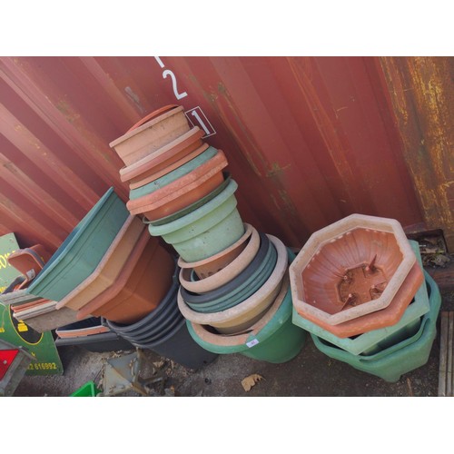 42 - Large quantity of plastic pots, planters, containers etc