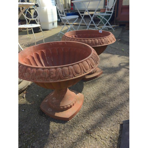 89 - Pair of plastic pedestal planters. H45cm D55cm