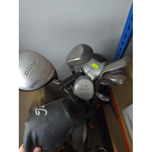 255 - Junior golf club set  and MXL bag with trolley. Together with Golf clubs (mostly Dunlop)