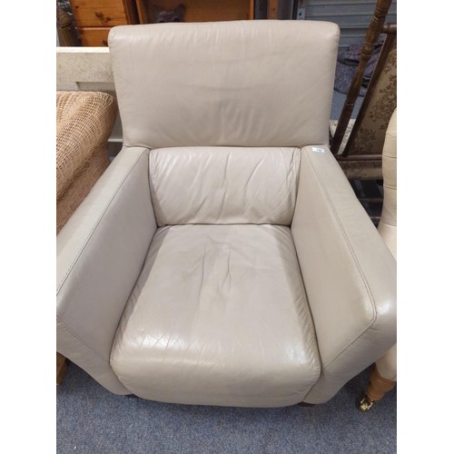 736 - Italian leather cream coloured armchair, 84cm wide x approx 84cm deep x 94cm high.