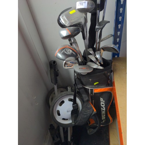 255 - Junior golf club set  and MXL bag with trolley. Together with Golf clubs (mostly Dunlop)