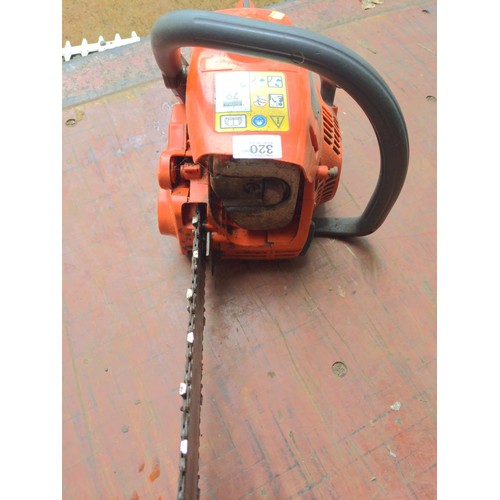 320 - Husqvarna 235 petrol chainsaw. Safety guard is missing, so is unsafe for use. Sold for repair/spares... 