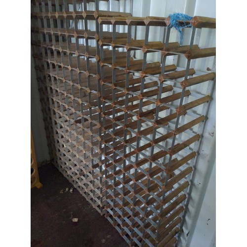 328 - Two large metal framed wine racks. Largest H150cm W90cm