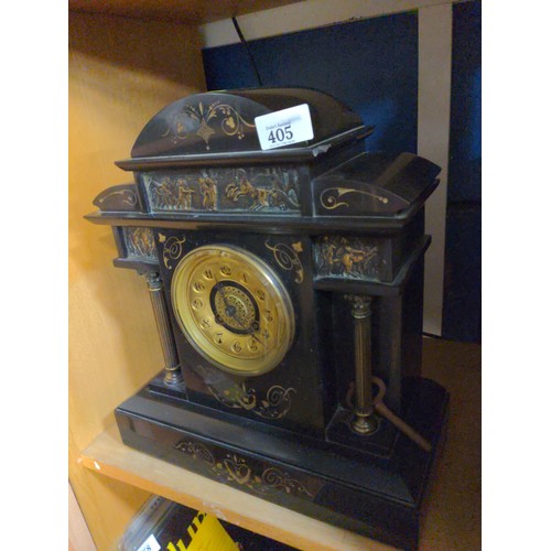 405 - Large heavy black marble with pillars mantle clock with key attached.