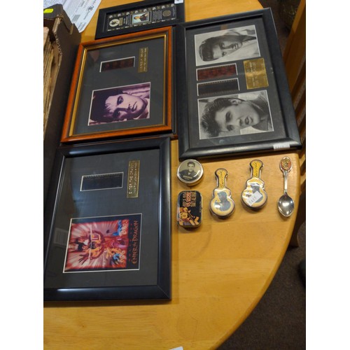 444 - Collection of Elvis and Bruce Lee (Enter the Dragon) framed film cells and tins & a tea spoon.