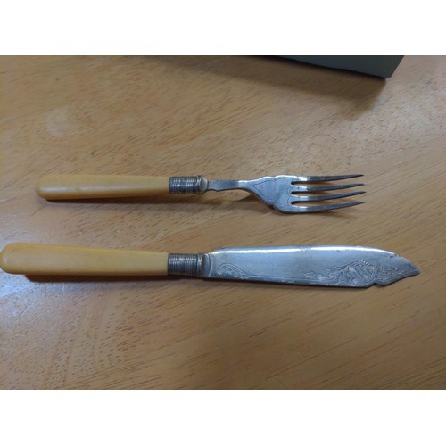 446 - Small set of silver plate fish knives and forks. 10 forksand nine knives.