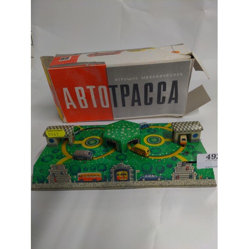 492 - ABTOTPACCA tin plate automobile toy.