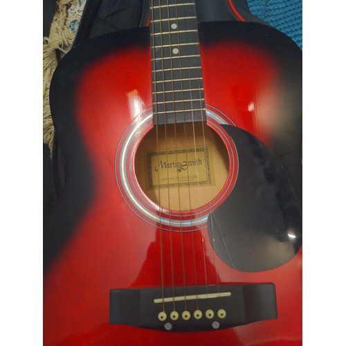 655 - Full size Martin Smith, model W-100-RD-PK acoustic guitar with with strings, soft case and Guitar fo... 