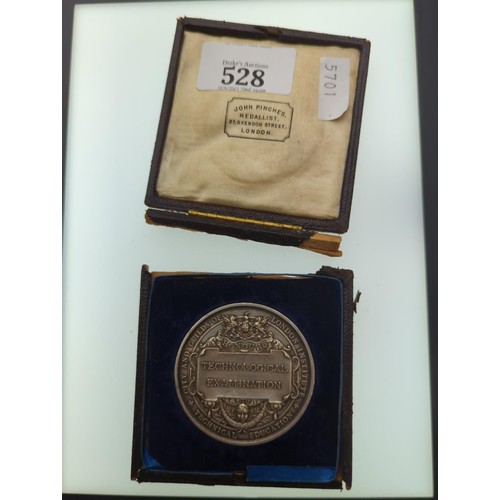 528 - City and Guilds of London Institute Technological Examination silver medal, awarded to William H. Ri... 