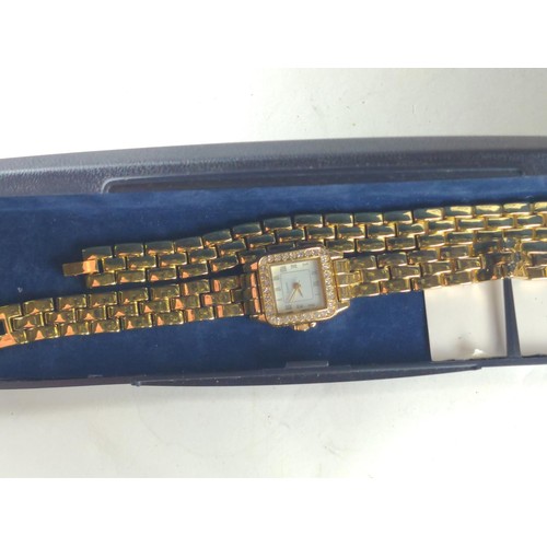 548 - Avia quartz gold tone dress watch and bracelet in box, together with a 1939 threepence pendant with ... 