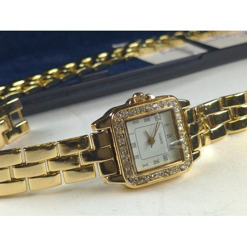 548 - Avia quartz gold tone dress watch and bracelet in box, together with a 1939 threepence pendant with ... 