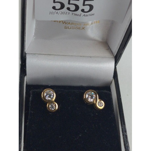 555 - Pair of 9ct gold & CZ earrings, one butterfly non gold, gross weight 1.95 grams