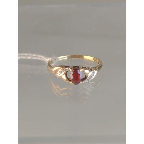 561 - 9ct gold, garnet & diamond ring, size Q, gross weight 1.73 grams