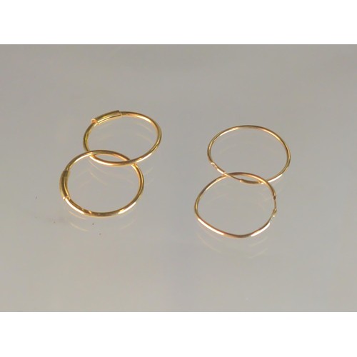 571A - Pair of 18ct hoop earrings, gross weight 1 gram, together with a pair of 9ct gold hoop earrings, gro... 