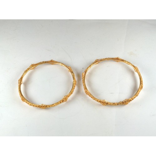 580 - Two filigree bangles