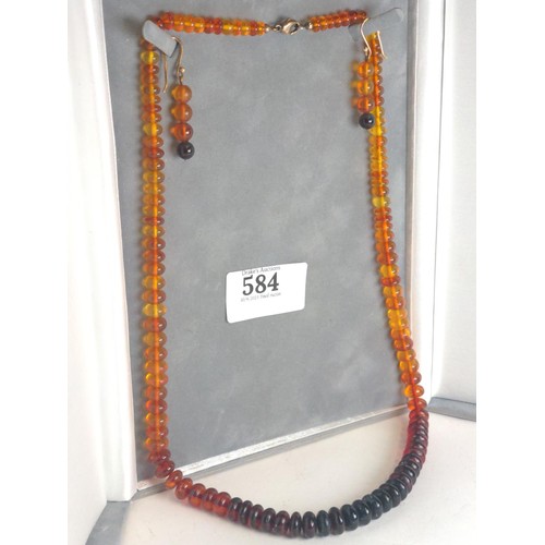 584 - Amber necklace & pair of earrings