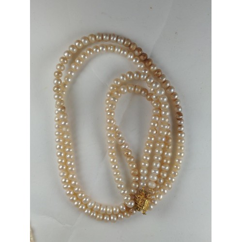 586 - Four various pearl necklaces, multi strand necklace missing third strand