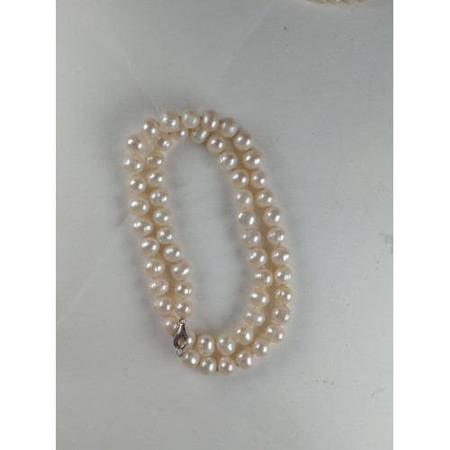 586 - Four various pearl necklaces, multi strand necklace missing third strand