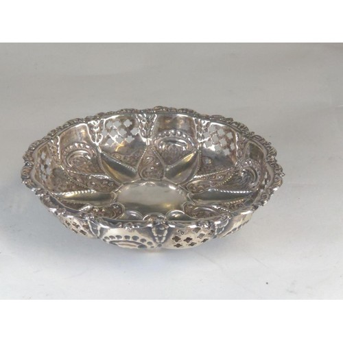 595 - Small pierced silver circular dish, J R Ltd, Birmingham 1904, diameter 11.3cm, 42.79 grams