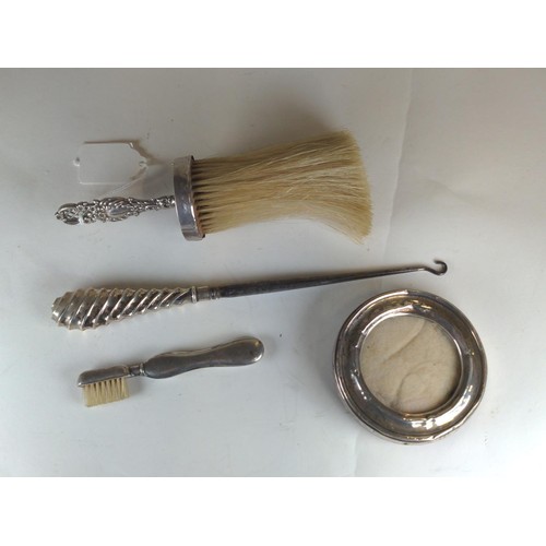 596 - Hallmarked silver handled brush, toothbrush & boot hook, together with a small hallmarked silver... 