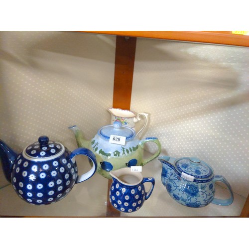 629 - Nice collection of tea pots and cream jugs in various colours and design.