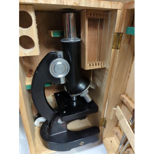 649 - Vintage Tasco 1000x microscope in wooden case