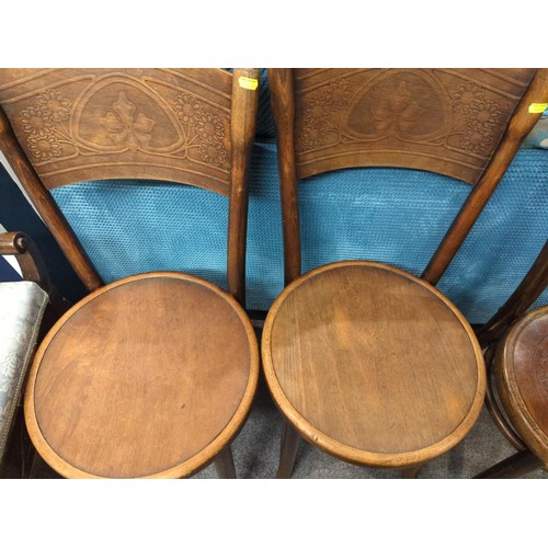 755 - Two Thonet penny chairs. With decorative backs.