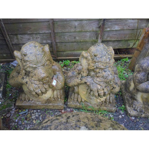 1C - Pair of shield bearing doorway gargoyles. H51cm