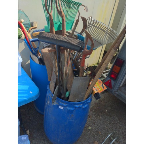 127 - 2 large tubs of long handled gardening tools