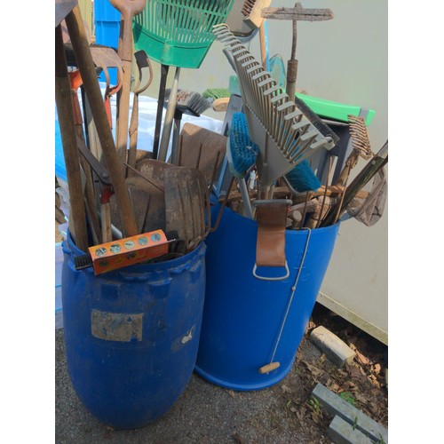 127 - 2 large tubs of long handled gardening tools