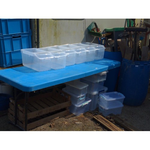 129 - Blue plastic topped trestle table. L180cm