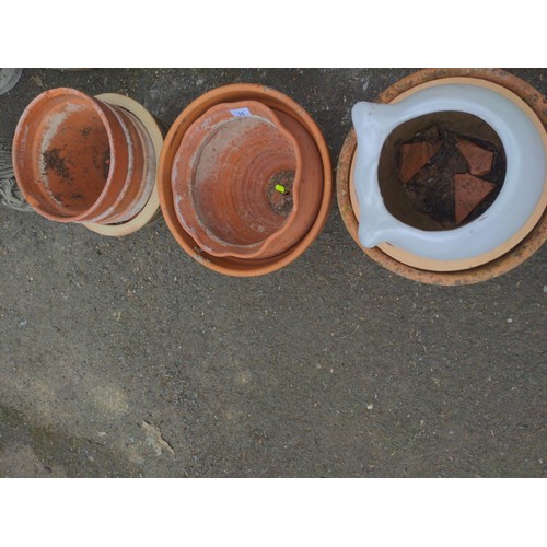 12 - 9 various type plant pots. Tallest H33cm