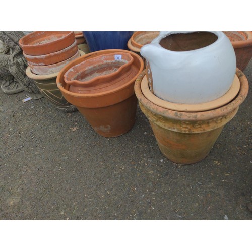 12 - 9 various type plant pots. Tallest H33cm