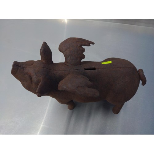 147 - Cast iron flying pig money box. L32cm