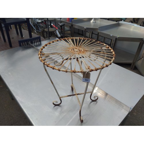 161 - Small metal garden table. D44cm H49cm