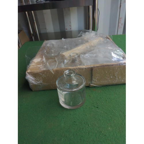 207 - 8x boxes (various sizes & fullness) of 200ml clear glass bottles