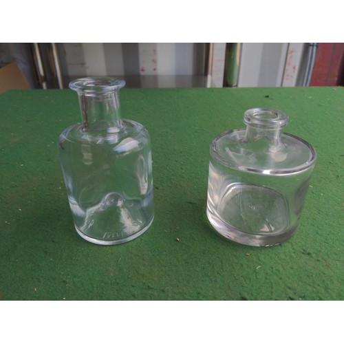 207 - 8x boxes (various sizes & fullness) of 200ml clear glass bottles