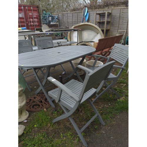 2 - Grey painted teak table & 4 folding chairs, by the Milan Collection