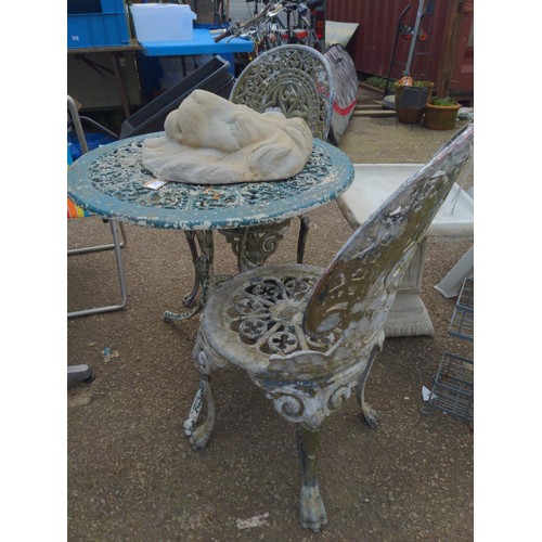 56 - Cast alloy garden table and 2 chairs, D68cm H64cm