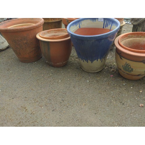 7 - 8 various plant pots. Tallest H35cm