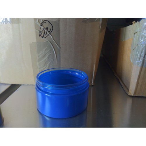 222 - 6 boxes of blue glass jars, some with lids, various types